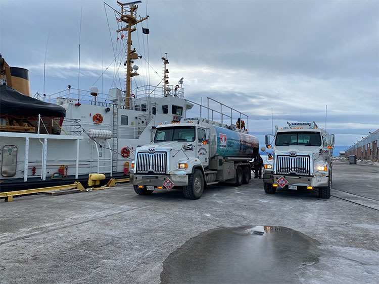 2-trucks-filling-ships-optimized